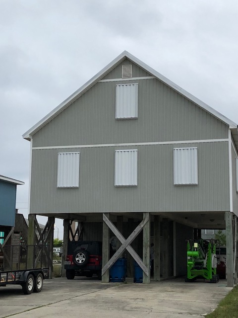 Hurricane shutters on Gulf Shores home.