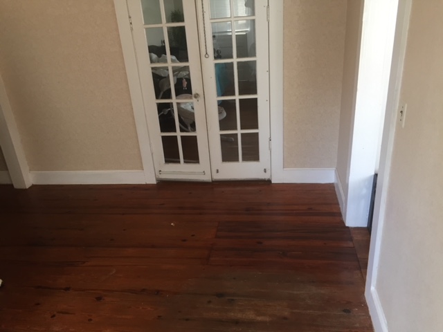 Repaired floor matched to original flooring